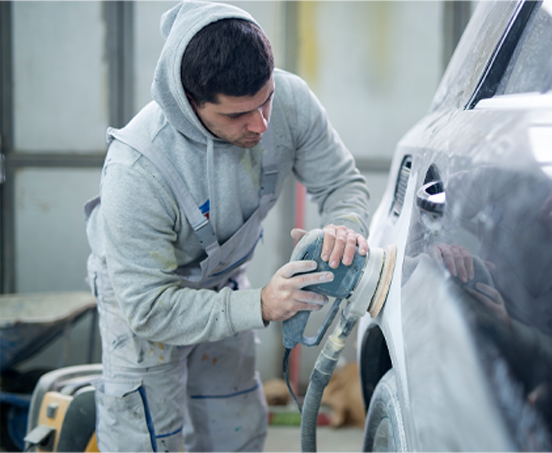 Moyer Collision Repair technicians working on a vehicle